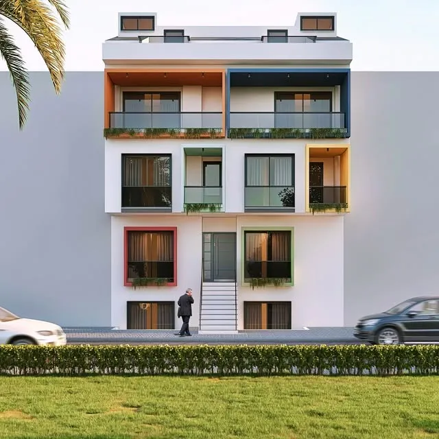 Beyaz cepheli, renkli balkon detaylı apartman